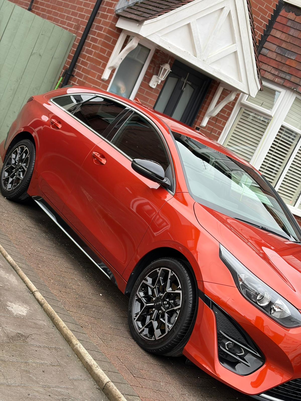Red Kia with fresh finish